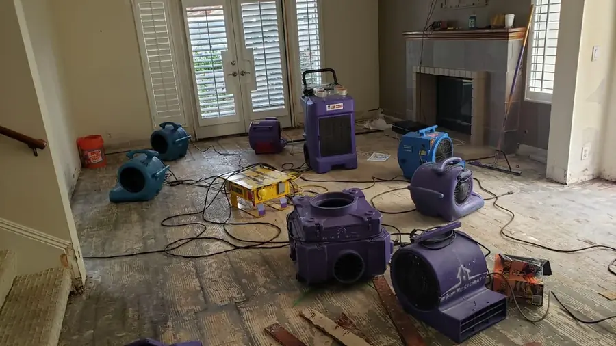 Drying equipment in a water damaged Saugus room