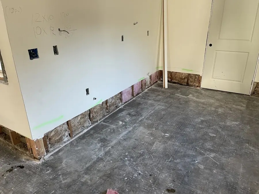 Walls cut back above a bare slab in Canyon Country